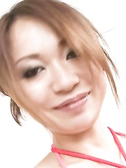 Sara Seori Asian has ball in mouth and body tied in red ropes