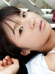 Miho Morita Asian takes school uniform off and shows body outdoor