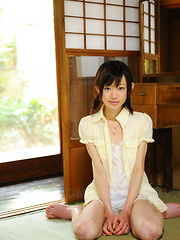 Cute slim teen Aoba Itou poses on the floor