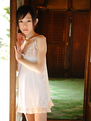 Cute slim teen Aoba Itou poses on the floor